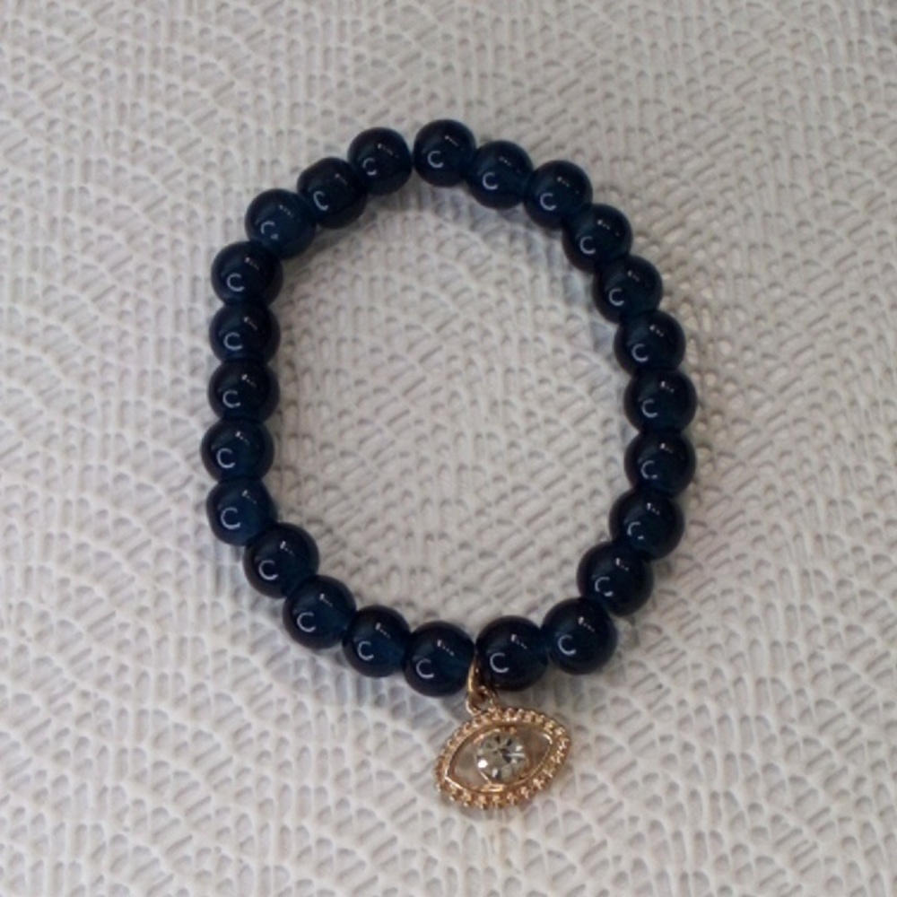 Nicole Miller Elegant Blue Beaded Bracelet with Gold Charm - Picture 2 of 3
